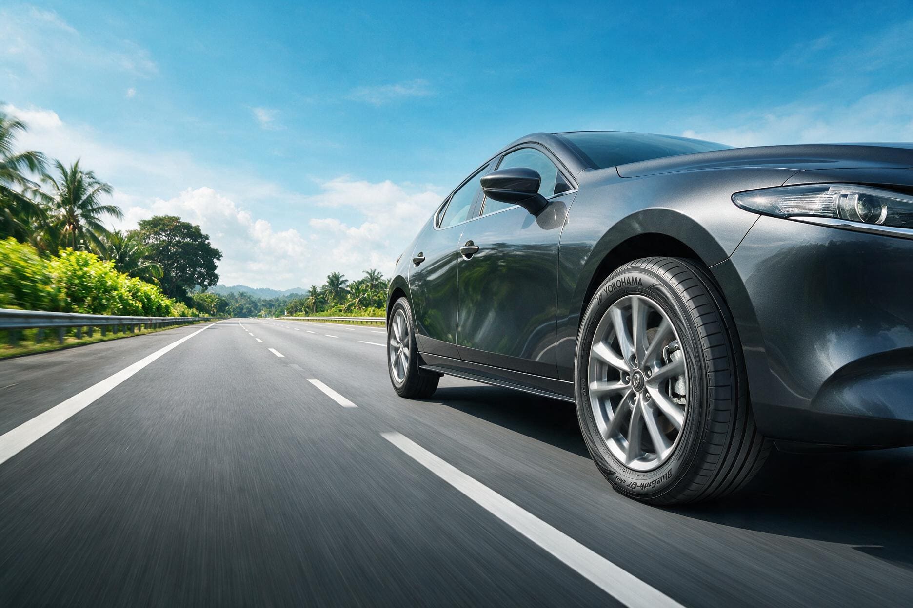 Yokohama BluEarth-GT AE51 fuel economy tyre fitted to a car driving on a Malaysian expressway.