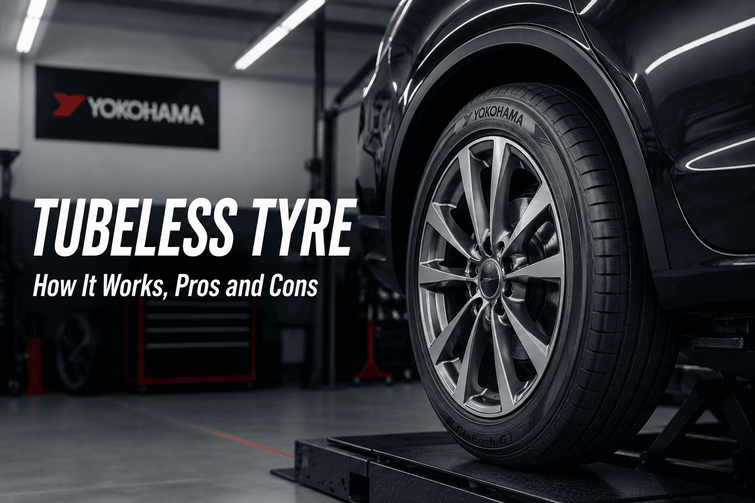 Yokohama BluEarth-GT tubeless tyre fitted on a modern car in a professional tyre workshop, highlighting its tread and sidewall design.
