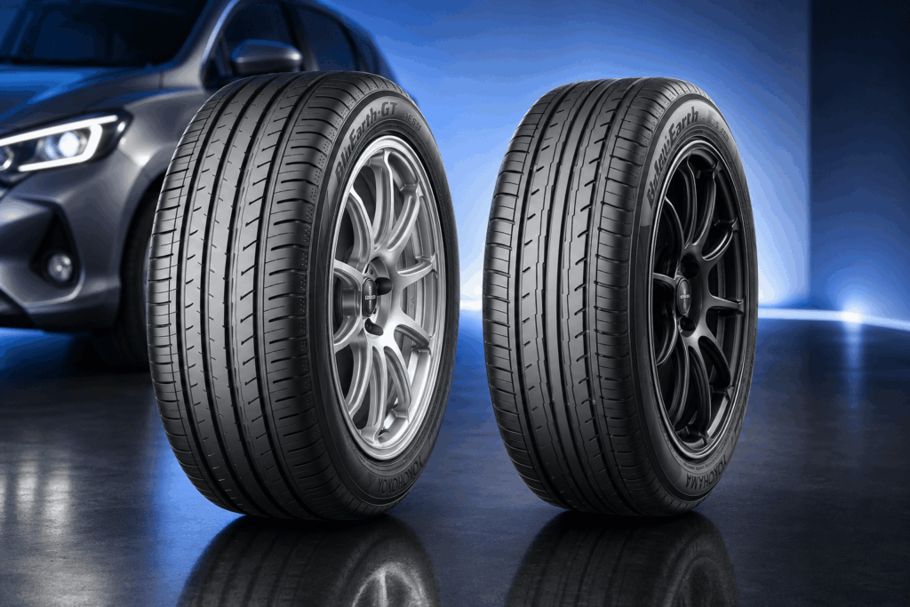 Yokohama BluEarth-GT AE51 and BluEarth-Es ES32 tyres displayed side by side in a modern automotive showroom.